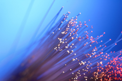 Monitoring stored nuclear waste with optical fibres